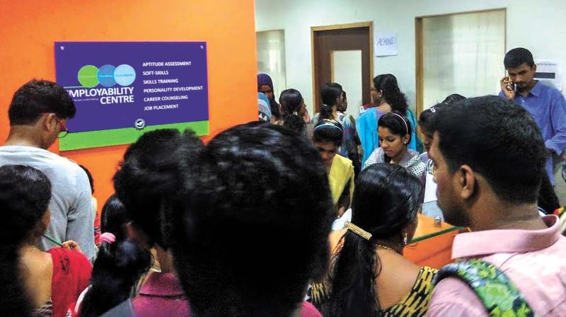 Job seekers queue up for registration at District Employability Centre in Kozhikode. (file pic)