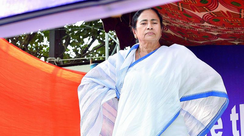 West Bengal Chief Minister Mamata Banerjee during a sit-in over the CBIs attempt to question the Kolkata police commissioner in connection with chit fund scams, in Kolkata, on Monday.  (PTI)