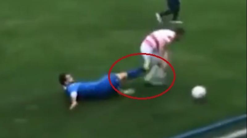 The painful tackle was caught on camera (Photo: YouTube)