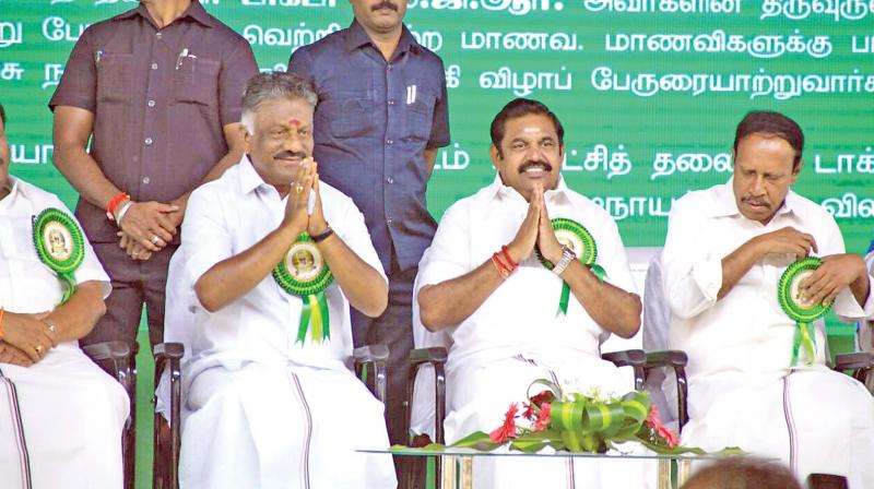 Chief Minister Edappadi K. Palaniswami and Deputy Chief Minister O. Panneerslevam participating MGR centenary celebrations at Theni on Thursday. (Photo: DC)