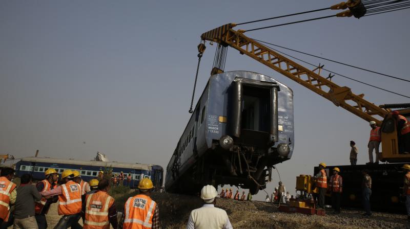 Over 115 passengers were killed and more than 200 injured when Indore-Patna Express derailed in Kanpur rural area early on Sunday morning. (photo: PTI)