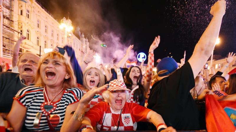 There were shouts of joy, hundreds of flares were lit and Croatian flags were waved as an estimated 15,000 fans celebrated the win for captain Luka Modrics side win in Zagrebs main square, where they had watched the match on a giant screen. (Photo: AFP)