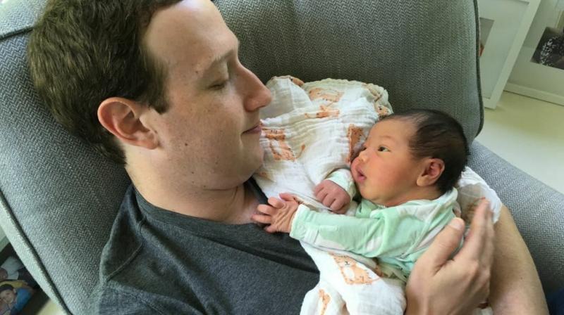 Mark Zuckerberg with second baby daughter August. (Photo: Facebook / Mark Zuckerberg)