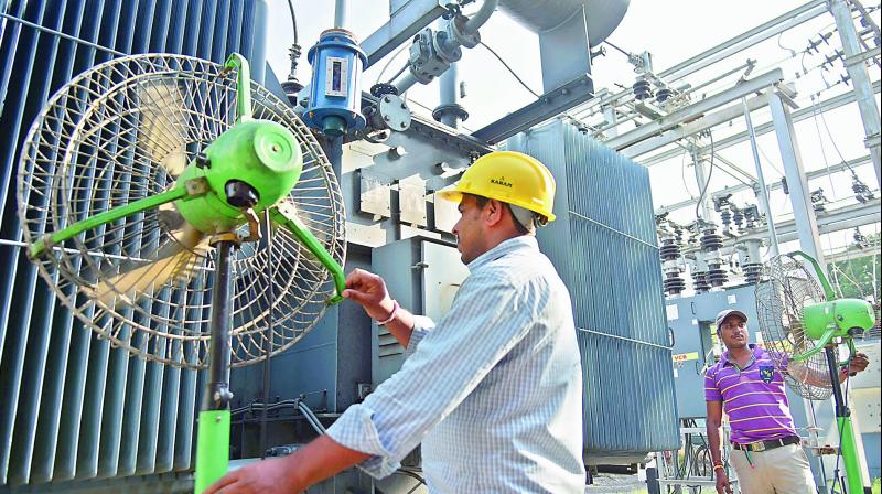 Fans installed beside transformers at Gymkhana sub-station to overcome excessive heating conditions witnessed this summer. (Photo: DC)