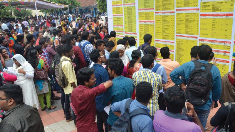 Rush at the job fair organised jointly by the Ministry of Labour & Employment and Kerala Chamber of Industries and Commerce. (Photo: DC File)