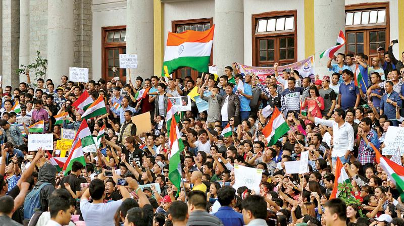 Hundreds of people from North east protest in front of Town Hall to extend support for Gorkhaland, in Bengaluru on Tuesday	Shashidhar B