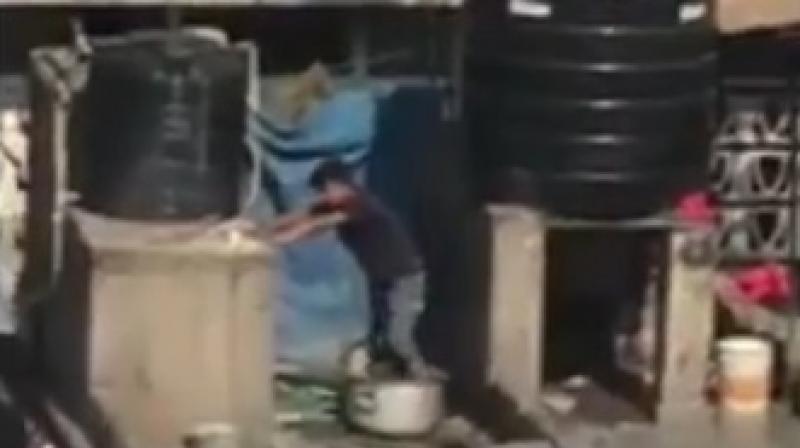 A team headed by Deputy Commissioner of Food Safety Department visited Kake Da Hotel and picked up food samples from there after a video emerged showing a man kneading dough with his feet. (Photo: Videograb)