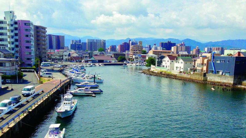 Located on the northern tip of Kyushu, the southernmost of Japans four main islands, Fukuoka is historically split by the Naka River between the castle town of Fukuoka and the merchant quarters of Hakata.