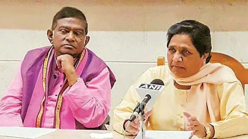 File picture of BSP chief Mayawati and Ajit Jogi