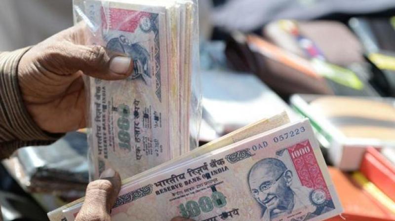 The CBDT has asked the taxman to scrutinise cases where a taxpayer has filed a revised income tax return (ITR) post demonetisation and directed them to slap \higher tax rate\ in instances where black money is detected. (Photo: AFP/Representational)