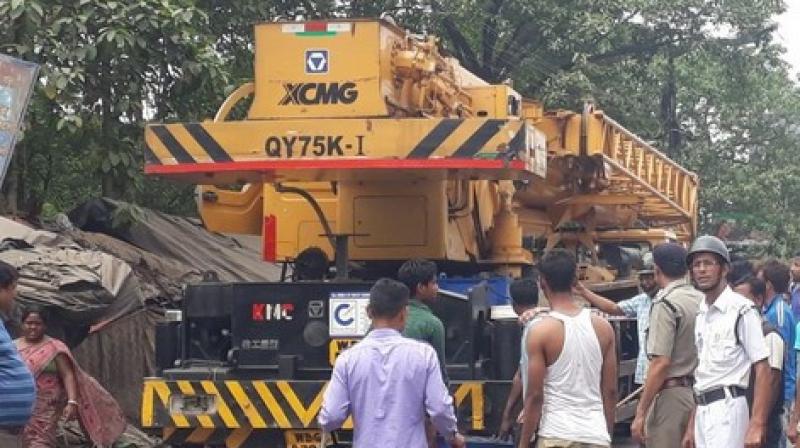 The driver absconded from the scene almost immediately, and soon, an angry mob started vandalising the crane. (Photo: ANI)