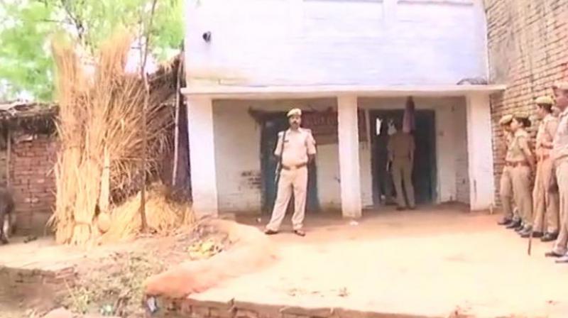 Special Investigation Team, headed by ADG Lucknow zone Rajeev Krishna, arrived at the residence of Unnao rape victim on Wednesday. (Photo: ANI)