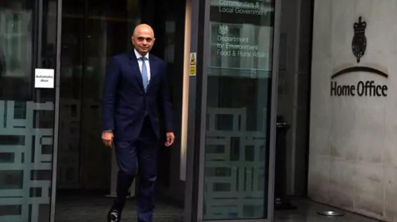 May named Sajid Javid, 48, as Rudds replacement in the key ministerial post of home secretary after she quit late Sunday. (Photo: AFP)