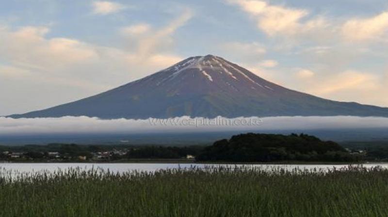 The snow-capped peak of the countrys highest mountain 100 kilometres (62 miles) west of Tokyo is a symbol of Japan -- and is also an active volcano. (Photo: AFP)