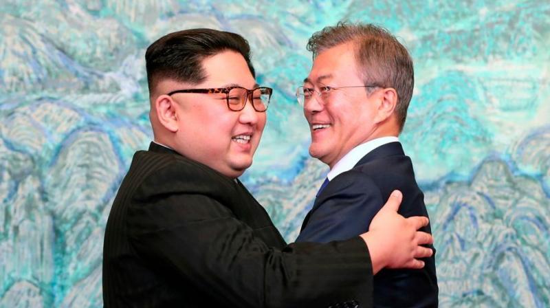 North Korean leader Kim Jong Un, left, and South Korean President Moon Jae-in embrace each other after signing a joint statement at the border village of Panmunjom in the Demilitarized Zone, South Korea on April 28. (Photo: AP)