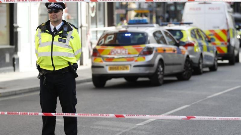 Londons Metropolitan Police said the pair, aged 13 and 15, were taken to hospitals after officers found them within minutes of each other nursing gunshot wounds at separate nearby locations in the suburb of Harrow. (Photo: AP)