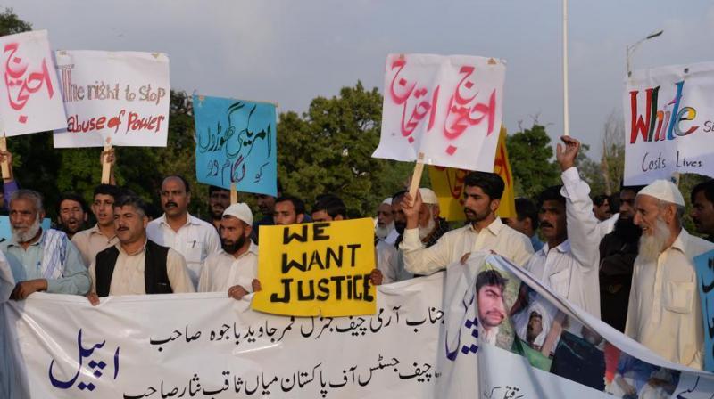 Pakistani protesters carry placards during a demonstration against the killing of a local resident in a car accident involving a US diplomat in Islamabad.(Photo: AFP)