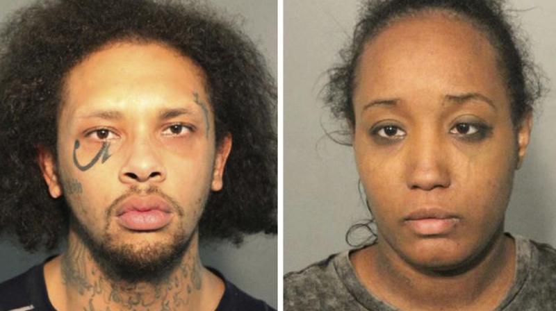 This photo combo of booking mugs provided by the Solano County Sheriffs Office in Fairfield, Calif., shows Jonathan Allen and his wife, Ina Rogers. (AP)