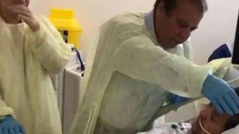 A visibly emotional Sharif can be seen talking to his unconscious wife in a London hospital before his return to Pakistan on July 12 to serve his 11-year jail term. (Photo: Video screengrab)