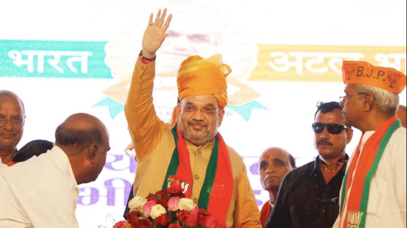 Party workers should think only about the party symbol Lotus and Bharat Mata (Mother India) when they campaign, he said at the Shakti Kendra Sammelan event. (Photo: Twitter | @AmitShah)