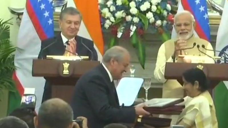 PM Narendra Modi and Uzbek President witness exchange of MoUs and agreements between India and Uzbekistan. (Photo: ANI | Twitter)