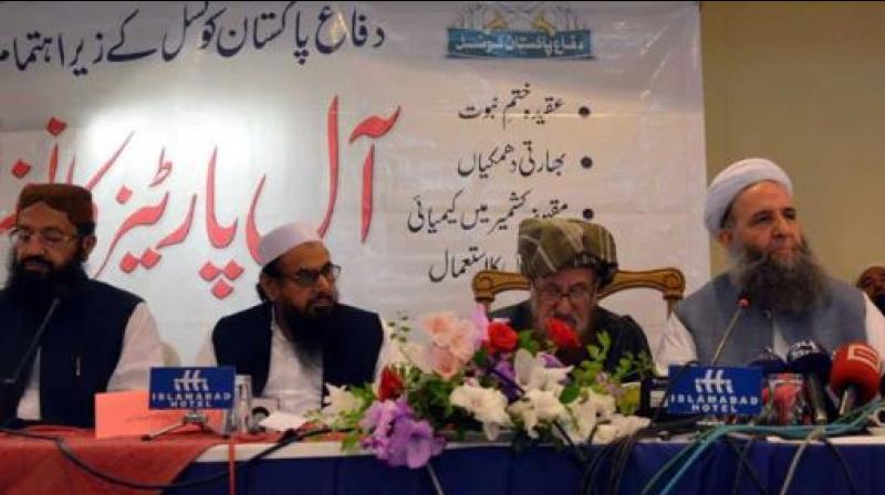 Qadri was seen seated near Hafiz Saeed as he addressed an all-party meet organised by the Difa-e-Pakistan Council in Islamabad on Sunday last. (Photo: Twitter)