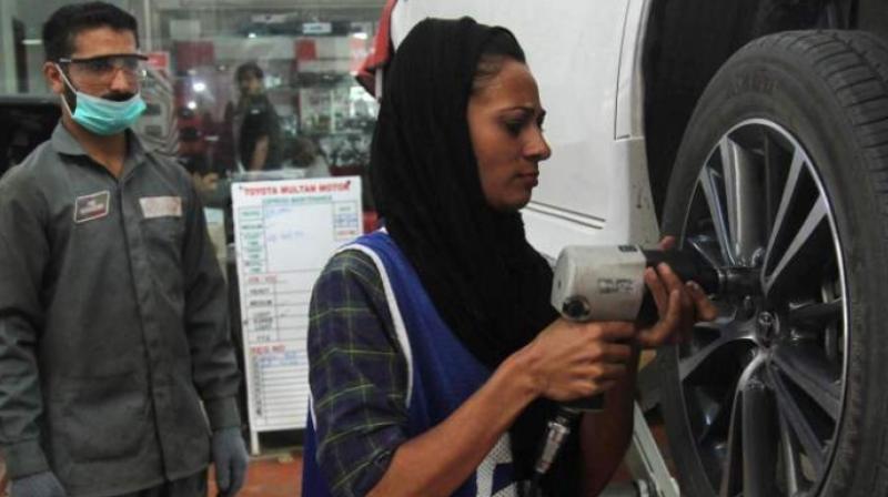 The 24-year-old spent years overcoming entrenched gender stereotypes and financial hurdles en route to earning a mechanical engineering degree and netting a job with an auto repairs garage in the eastern city of Multan. (Photo: AFP)