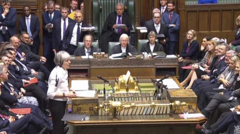 Britains Prime Minister Theresa May addresses the House of Commons, London, with an update on the latest developments in the Brexit negotiations. (Photo: AP)