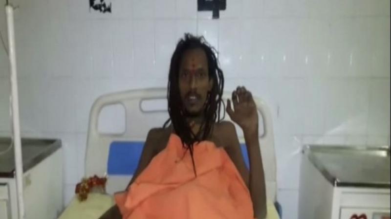 The sadhu identified as Madani Baba, who is currently admitted in a hospital in Bamna district, alleged that a conspiracy was hatched against him by a group of people as they could not bear his aim to build an ashram in an empty land. (Photo: ANI)