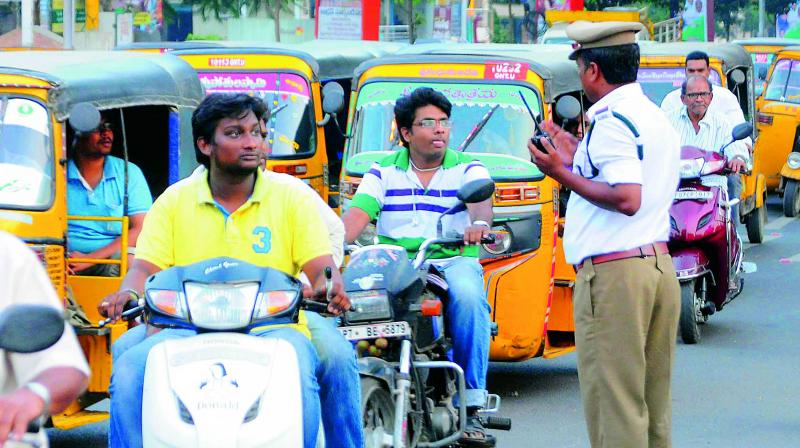 Minor boys seen riding motorcycles on the main roads of Guntur. A new rule to be implemented in Guntur by the traffic police to file cases on parents if a minor is caught riding a motorcycle. (Photo: DC)
