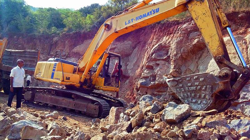 The ghat road construction works along the Kondaveedu fort restarted in Guntur on Saturday. (Photo: DC)