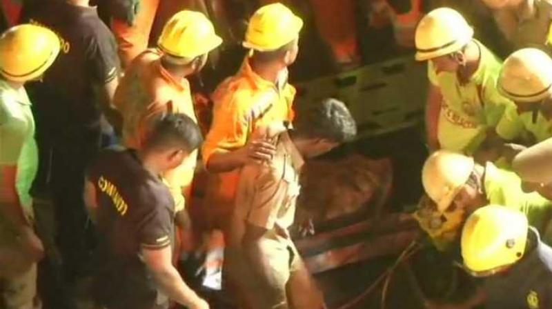 Fire and safety personnel involved in rescue operations at the Kandanchavadi building collapse site. (Photo : Twitter/ANI)