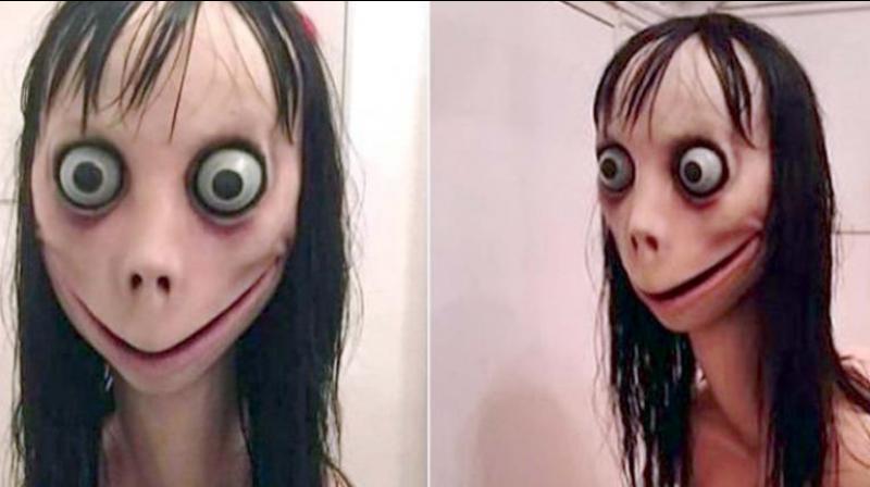 Once the contact is added, the image of a terrifying Japanese Momo doll with bulging eyes appears in the list.