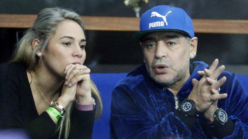 Police officers were dispatched after a call from the Madrid hotel, but found no evidence of any serious disturbance after talking to Diego Maradona and his girlfriend, Rocio Oliva. (Photo: AP)