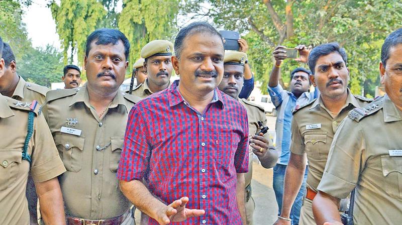 Police personnel take A.G. Perarivalan back to jail after his parole ended on Tuesday in Vellore. (Photo: DC)