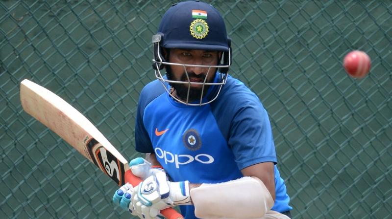 Cheteshwar Pujara, who produced back-to-back big knocks in the Ranji Trophy, was concentration personified during a practice session ahead of the Test series against Sri Lanka.(Photo: AFP)