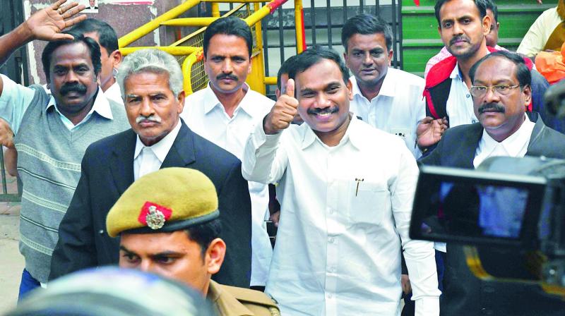Former telecom minister A. Raja gestures after his acquittal. (Photo: PTI)