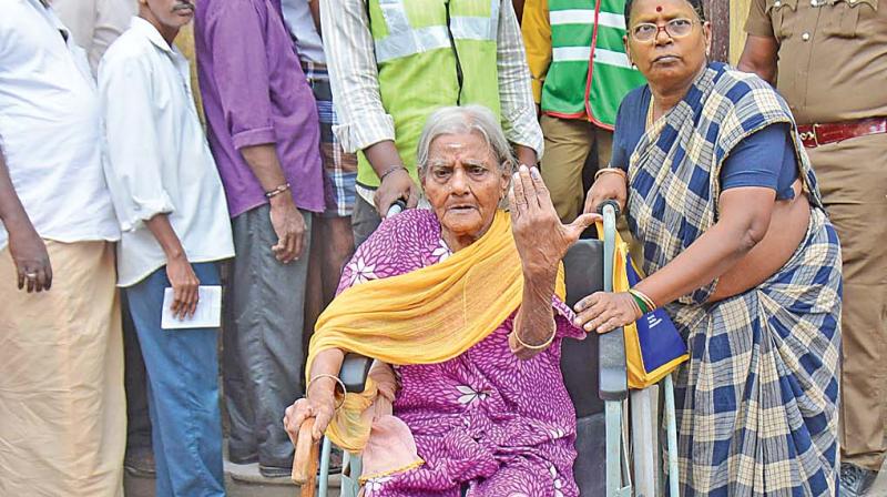 Ninety-year-old Parvathammal after casting her vote at Old Washermenpet on Thursday. (Photo: DC)