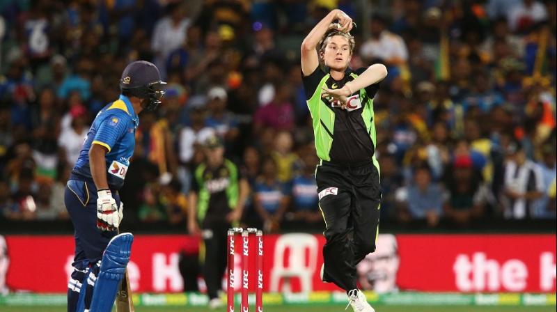 Adam Zampa, who replaced Andrew Tye for the dead rubber, had in form Asela Gunaratne (4) lbw and then accounted for the wickets of Chamara Kapugedera and Dasun Shanaka in one over. (Photo: AFP)