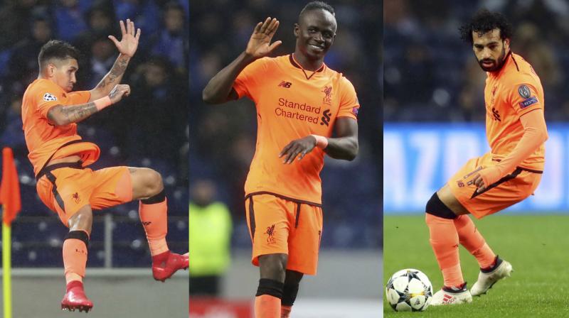 While Sadio Sane hammered three goals, Mohamed Salah, who scored his 30th goal of the season, and Roberto Firmino scored a goal each to complete Liverpools Porto thrashing. (Photo: AP)