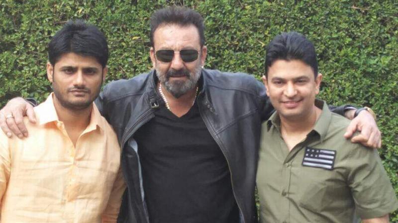 Sanjay Dutt with T-Series head Bhushan Kumar and co-producer of the film Sandeep Singh.