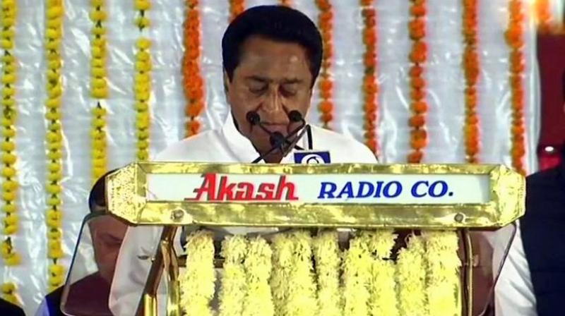 Congress leader Kamal Nath was sworn in as the 18th chief minister of Madhya Pradesh in Bhopal. (Photo: ANI)