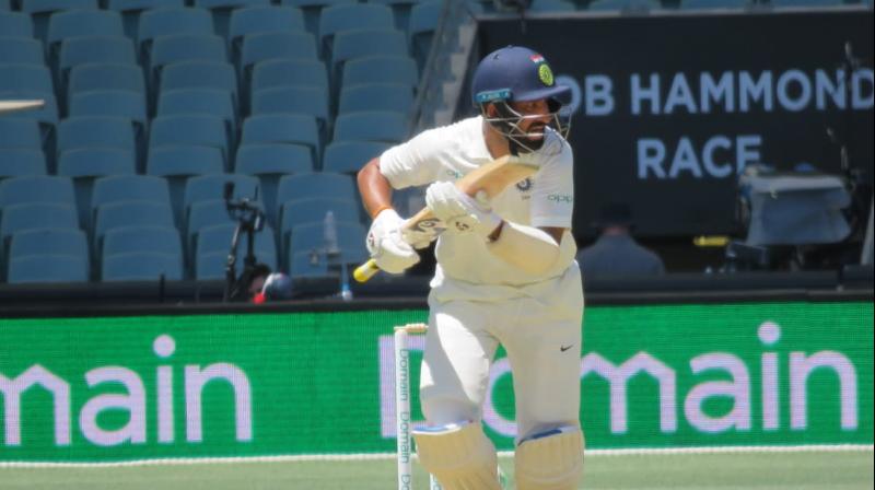 Cheteshwar Pujara scored his 16th Test century as India continued their fightback on Day 1 of the first Test against Australia.(Photo: Twitter / BCCI)