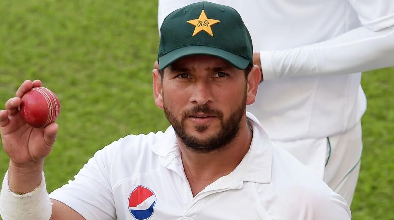 Pakistans leg-spinner Yasir Shah Thursday became the fastest cricketer to take 200 Test wickets, breaking an 82-year-old record on the fourth day of the third Test against New Zealand. (Photo: AFP)