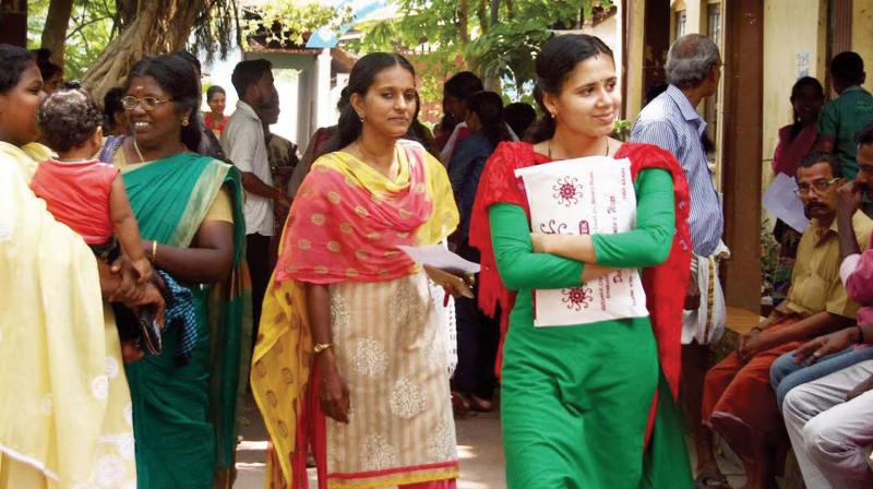 Women coming out after attending a selection test for Kochi metro staff, at Govt. Girls HSS in Kochi on Sunday. 	(Photo: DC)
