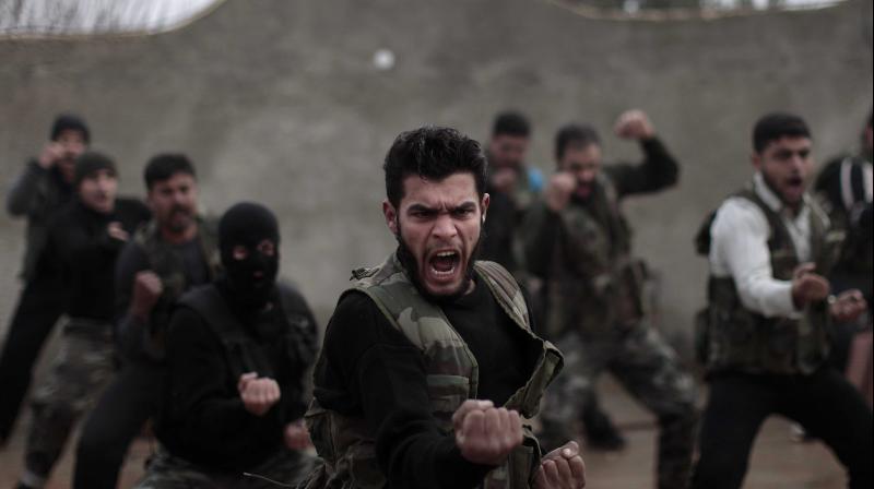 Colonel Ahmed Osman, of the Turkey-backed Sultan Murad rebel group said any action that will put an end to the regime is welcome. (Photo: AP)