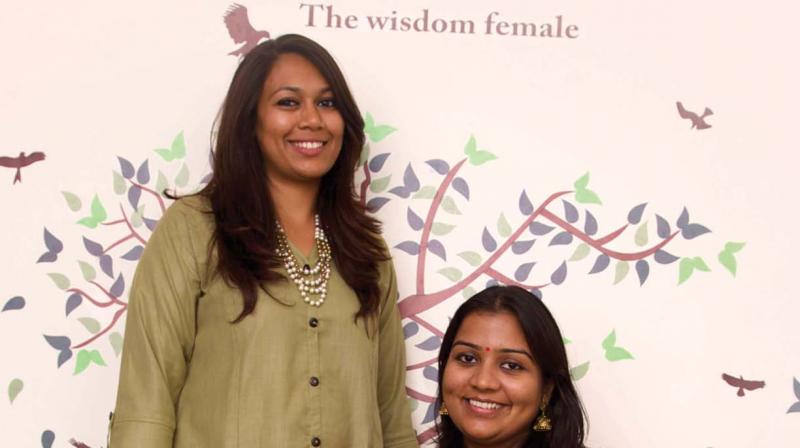 Vandhana Ramanathan (sitting) and Jinal Patel (standing)