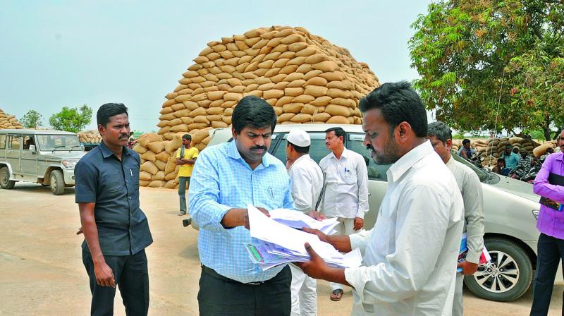 Nellore district collector R. Muthyala Raju at a paddy procurement centre near a rice mill in Kaligiri in SPSR Nellore district on Wednesday. (Photo: DC)