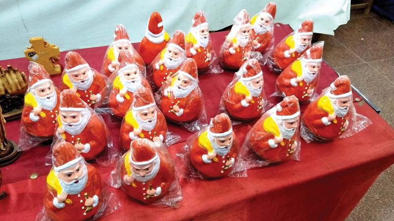 Thanjavur dolls in the form of Santa claus are onfor sale at Thanjavur. (Photo: DC)