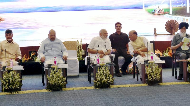 Prime Minister Narendra Modi, BJP President Amit Shah, TDP President N Chandrababu Naidu, Home Minister Rajnath Sigh and SAD President Parkash Singh Badal at a meeting of National Democratic Alliance at Pravasi Baratiya Kendra in New Delhi. (Photo: PTI)